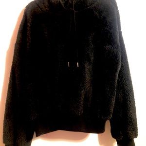 black fluffy jacket kinda cropped